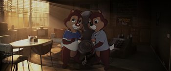Movie still from “Chip 'n Dale: Rescue Rangers” (2022), directed by Akiva Schaffer – A couple of people that are standing in a room; Wide shot, High angle
