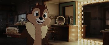 Movie still from “Chip 'n Dale: Rescue Rangers” (2022), directed by Akiva Schaffer – A cartoon character is standing next to a mirror; Medium shot, Over the shoulder angle