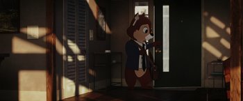 Movie still from “Chip 'n Dale: Rescue Rangers” (2022), directed by Akiva Schaffer – A cartoon character is standing in front of a door; Wide shot, Over the shoulder angle