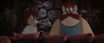 Movie still from “Chip 'n Dale: Rescue Rangers” (2022), directed by Akiva Schaffer – A couple of people that are in a room together; Medium shot, Over the shoulder angle