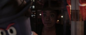 Movie still from “Chip 'n Dale: Rescue Rangers” (2022), directed by Akiva Schaffer – A woman looking into a mirror at night time; Close Up shot, Over the shoulder angle