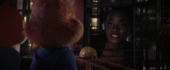 Movie still from “Chip 'n Dale: Rescue Rangers” (2022), directed by Akiva Schaffer – A woman looking at a teddy bear in a mirror; Close Up shot, Over the shoulder angle