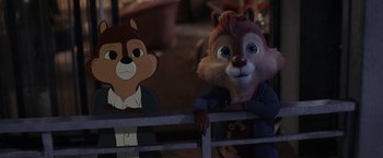 Movie still from “Chip 'n Dale: Rescue Rangers” (2022), directed by Akiva Schaffer – A couple of cartoon characters sitting next to each other; Medium shot, Over the shoulder angle