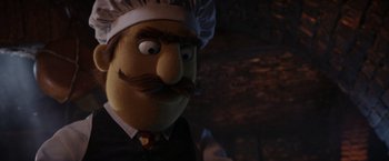 Movie still from “Chip 'n Dale: Rescue Rangers” (2022), directed by Akiva Schaffer – The face of a character dressed in a suit; Close Up shot, Low angle