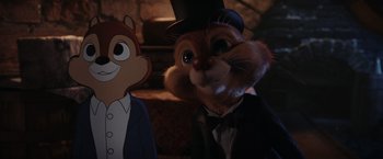 Movie still from “Chip 'n Dale: Rescue Rangers” (2022), directed by Akiva Schaffer – A picture of a character in a suit and top hat; Close Up shot, Over the shoulder angle