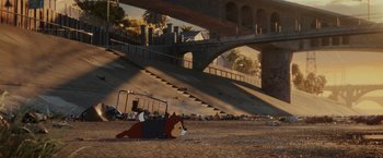 Movie still from “Chip 'n Dale: Rescue Rangers” (2022), directed by Akiva Schaffer – A scene of a cartoon character laying on the ground; Wide shot, High angle