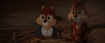 Movie still from “Chip 'n Dale: Rescue Rangers” (2022), directed by Akiva Schaffer – A couple of chipmunks sitting at a table with drinks; Medium shot, High angle