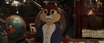 Movie still from “Chip 'n Dale: Rescue Rangers” (2022), directed by Akiva Schaffer – A cartoon of a squirrel wearing a suit and tie; Medium shot, Over the shoulder angle