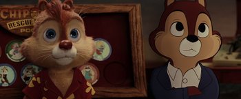 Movie still from “Chip 'n Dale: Rescue Rangers” (2022), directed by Akiva Schaffer – A picture of a chipmunk next to a picture of a chipmunk; Close Up shot, Over the shoulder angle