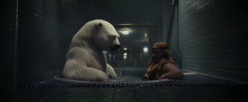 Movie still from “Chip 'n Dale: Rescue Rangers” (2022), directed by Akiva Schaffer – A polar bear sitting next to a man in a tub; Wide shot, Over the shoulder angle