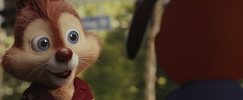 Movie still from “Chip 'n Dale: Rescue Rangers” (2022), directed by Akiva Schaffer – A stuffed animal in a park setting; Close Up shot, Over the shoulder angle