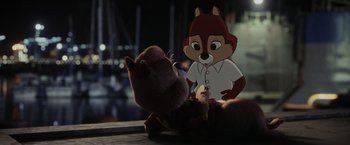 Movie still from “Chip 'n Dale: Rescue Rangers” (2022), directed by Akiva Schaffer – A stuffed animal and a stuffed animal in the shape of a squirrel; Medium shot, Over the shoulder angle