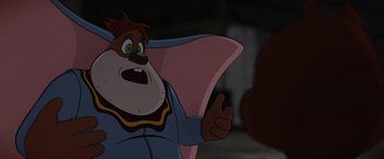 Movie still from “Chip 'n Dale: Rescue Rangers” (2022), directed by Akiva Schaffer – A cartoon character with his arm outstreched; Close Up shot, Over the shoulder angle