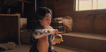 Movie still from “Chupa” (2023), directed by Jonás Cuarón – Medium shot, Low angle