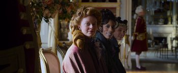 Movie still from “Cinderella” (2021), directed by Kay Cannon – Medium shot, Low angle