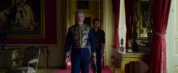 Movie still from “Cinderella” (2021), directed by Kay Cannon – Medium shot, Low angle