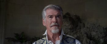 Movie still from “Cinderella” (2021), directed by Kay Cannon – An older man with a white beard and mustache; Close Up shot, Low angle