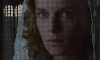 Movie still from “Cinema Paradiso” (1988), directed by Giuseppe Tornatore – A woman's face through a window; Close Up shot, Low angle