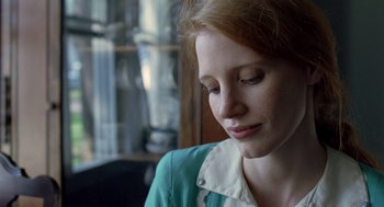 Movie still from “The Tree of Life” (2011), directed by Terrence Malick – A person wearing a green shirt; Close Up shot, Over the shoulder angle