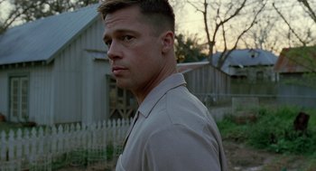Movie still from “The Tree of Life” (2011), directed by Terrence Malick – A person standing in a field; Close Up shot, Low angle