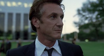 Movie still from “The Tree of Life” (2011), directed by Terrence Malick – A person wearing a suit and tie; Close Up shot, Low angle