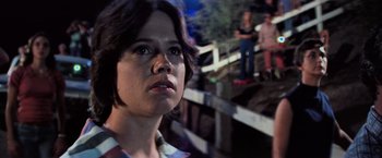 Movie still from “Close Encounters of the Third Kind” (1977), directed by Steven Spielberg – A person looking at the camera; Close Up shot, Low angle
