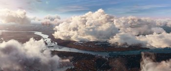 Movie still from “Clouds” (2020), directed by Justin Baldoni – A view of a body of water and a cloud filled sky; Extreme Wide shot, Overhead angle