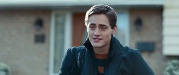 Movie still from “Clouds” (2020), directed by Justin Baldoni – A young man wearing a black jacket and a brown sweater; Close Up shot, Over the shoulder angle