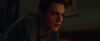 Movie still from “Clouds” (2020), directed by Justin Baldoni – A young man is looking into the distance; Close Up shot, Over the shoulder angle