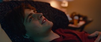 Movie still from “Clouds” (2020), directed by Justin Baldoni – A person laying on a bed; Close Up shot, Over the shoulder angle