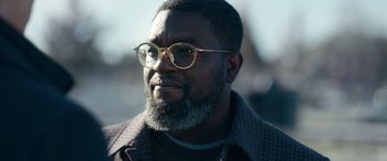 Movie still from “Clouds” (2020), directed by Justin Baldoni – A person with a beard wearing glasses; Close Up shot, Low angle