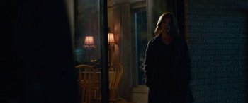 Movie still from “Clouds” (2020), directed by Justin Baldoni – A woman standing in front of an open door; Medium shot, Over the shoulder angle