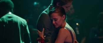 Movie still from “Clouds” (2020), directed by Justin Baldoni – A man and a woman hugging each other in a dark room; Close Up shot, Over the shoulder angle