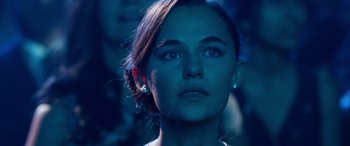 Movie still from “Clouds” (2020), directed by Justin Baldoni – A woman's face in the dark; Close Up shot, Over the shoulder angle