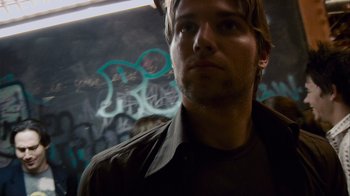 Movie still from “Cloverfield” (2008), directed by Matt Reeves – A person in a dark room; Close Up shot, Low angle