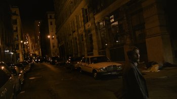 Movie still from “Cloverfield” (2008), directed by Matt Reeves – Many cars parked on the side of the street; Wide shot, Low angle