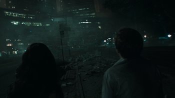 Movie still from “Cloverfield” (2008), directed by Matt Reeves – A man standing next to a pile of rubble; Wide shot, High angle