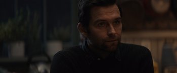 Movie still from “Cobweb” (2023), directed by Samuel Bodin – A person wearing a black shirt; Close Up shot, Over the shoulder angle