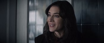 Movie still from “Cobweb” (2023), directed by Samuel Bodin – A person with long black hair; Close Up shot, Over the shoulder angle