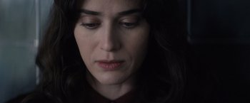 Movie still from “Cobweb” (2023), directed by Samuel Bodin – A woman's face in the dark; Close Up shot, High angle