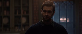 Movie still from “Cobweb” (2023), directed by Samuel Bodin – A person wearing a sweater; Close Up shot, Over the shoulder angle