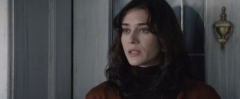 Movie still from “Cobweb” (2023), directed by Samuel Bodin – A person with long black hair; Close Up shot, Over the shoulder angle