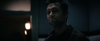 Movie still from “Cobweb” (2023), directed by Samuel Bodin – A person wearing a jacket; Close Up shot, Over the shoulder angle