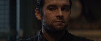 Movie still from “Cobweb” (2023), directed by Samuel Bodin – A person looking at the camera; Close Up shot, Over the shoulder angle