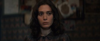 Movie still from “Cobweb” (2023), directed by Samuel Bodin – A person wearing a plaid shirt; Close Up shot, Over the shoulder angle