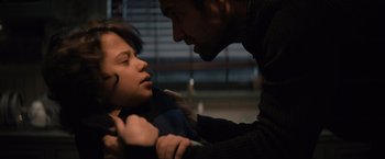 Movie still from “Cobweb” (2023), directed by Samuel Bodin – A man and a woman are looking at each other; Close Up shot, Over the shoulder angle