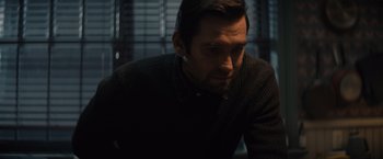 Movie still from “Cobweb” (2023), directed by Samuel Bodin – A person wearing a sweater; Close Up shot, Over the shoulder angle