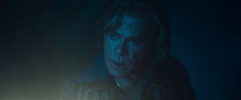 Movie still from “Cocaine Bear” (2023), directed by Elizabeth Banks – A person wearing a jacket; Close Up shot, Low angle