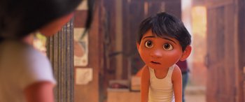 Movie still from “Coco” (2017), directed by Adrian Molina – A character's face in a scene from pixar's coco; Close Up shot, Over the shoulder angle