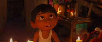 Movie still from “Coco” (2017), directed by Adrian Molina – A young boy is looking up at the ceiling; Close Up shot, Low angle
